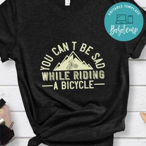 you can't be sad while riding a bicycle T Shirt